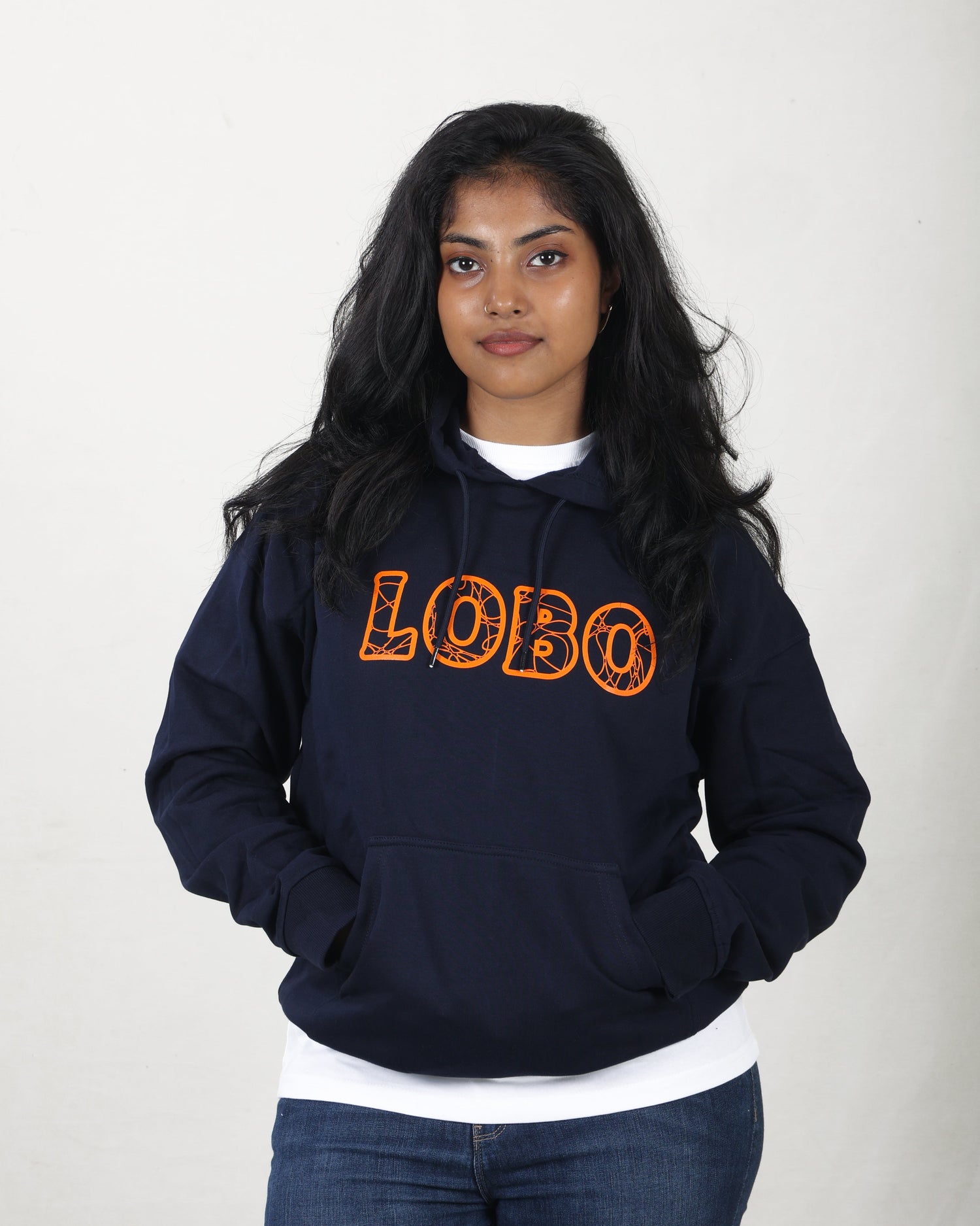Person wearing a navy hoodie with 'LOBO' printed in orange on a plain background