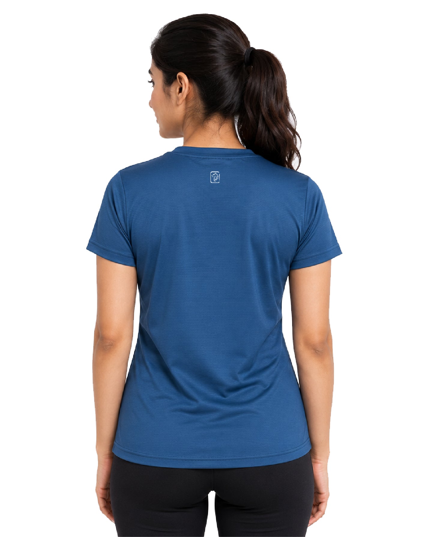 A woman viewed from the back wearing a short-sleeve athletic t-shirt in a medium blue color, paired with black leggings, against a plain white background.