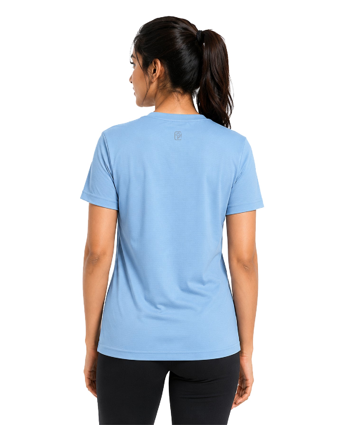 A woman viewed from the back wearing a light blue short-sleeve athletic T-shirt and black leggings against a plain white background.